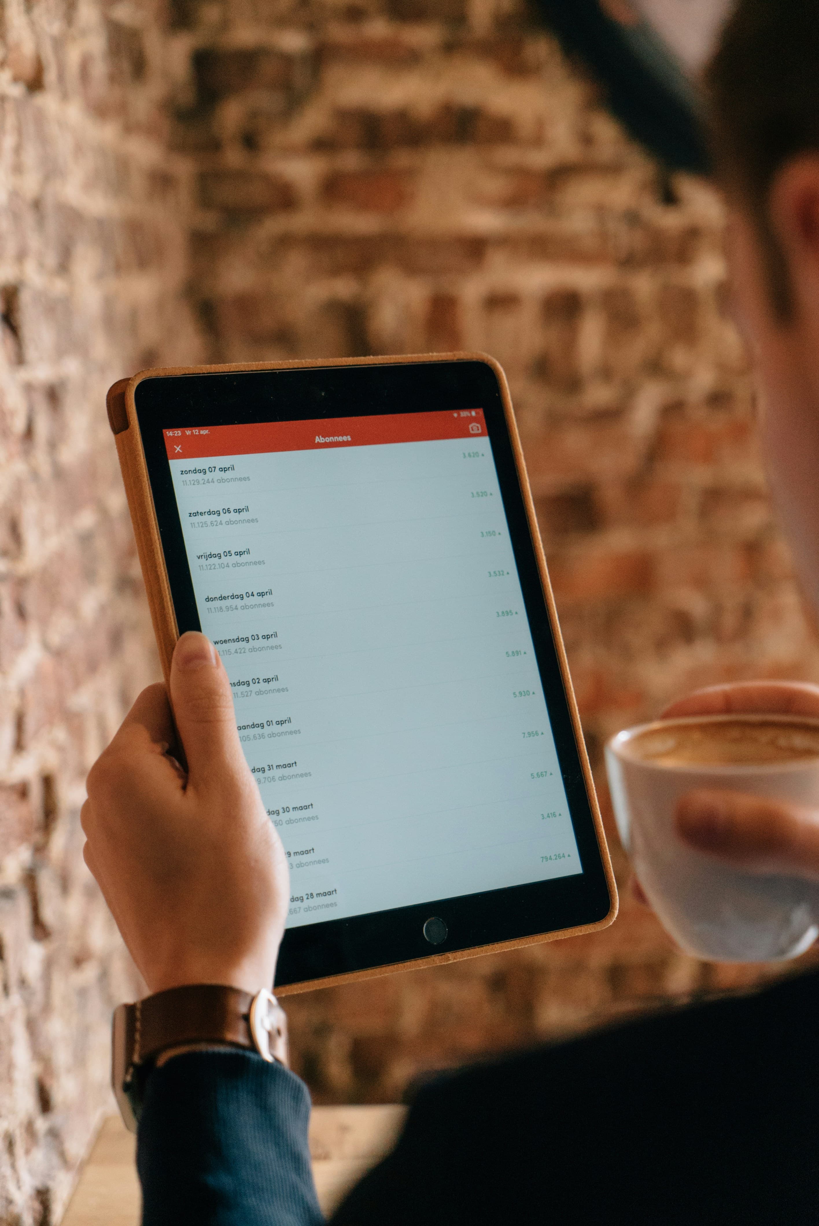 Worker reviewing task template on tablet