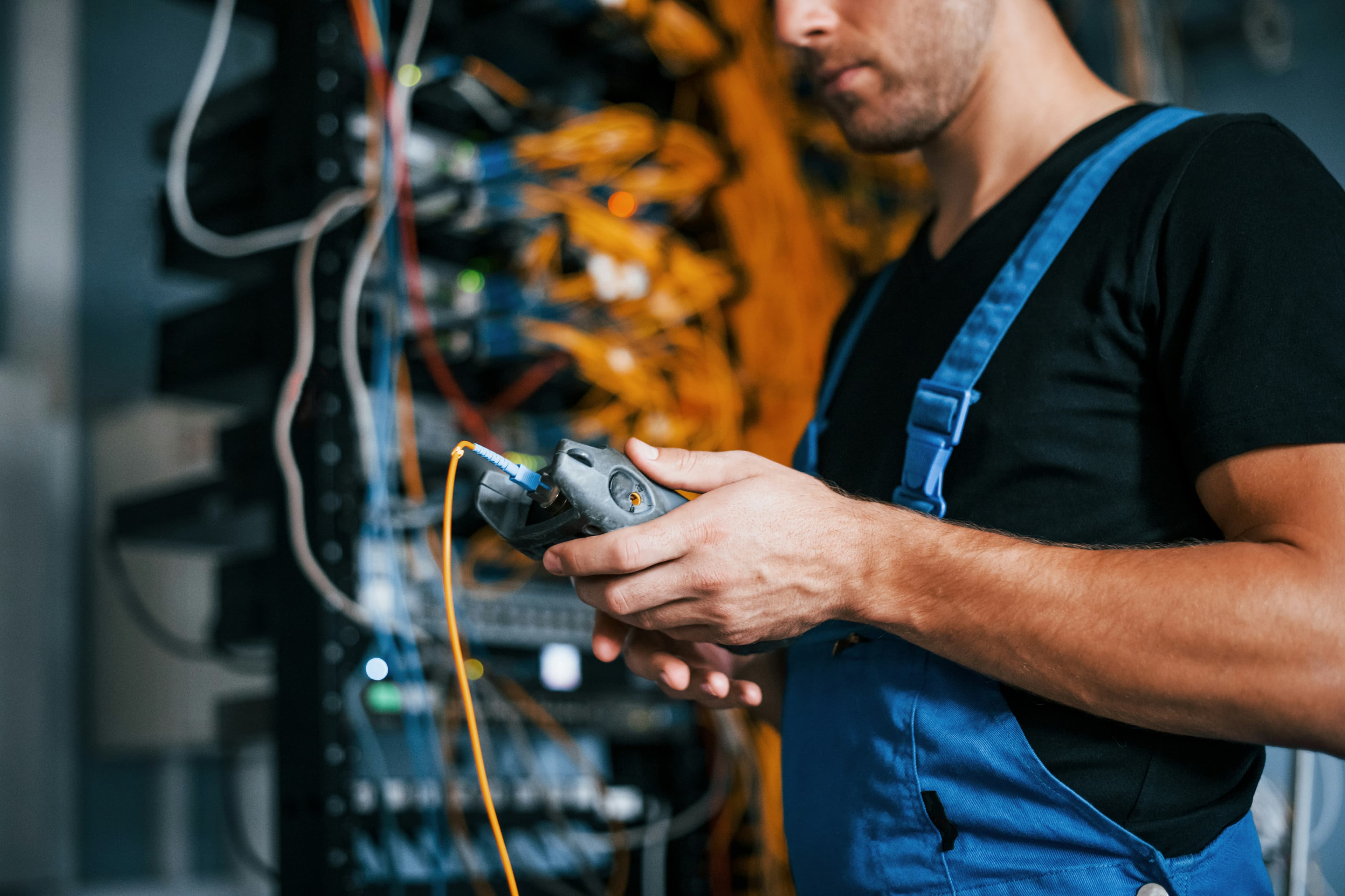 Electrician testing electrical connections